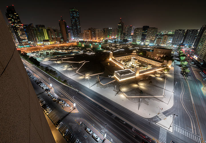 Nighttime view of the Qasr Al Hosn masterplan in Abu Dhabi designed by CEBRA Architecture. A historical site in the UAE.